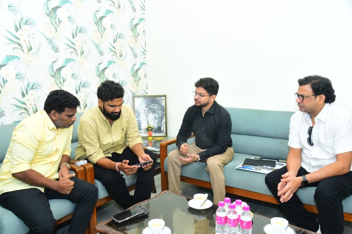 BrovAI representatives discussing the AI Ambassador School program
